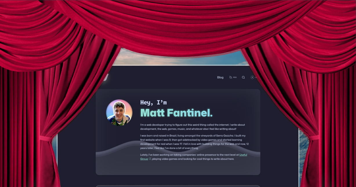 Screenshot of website being revealed between red curtains